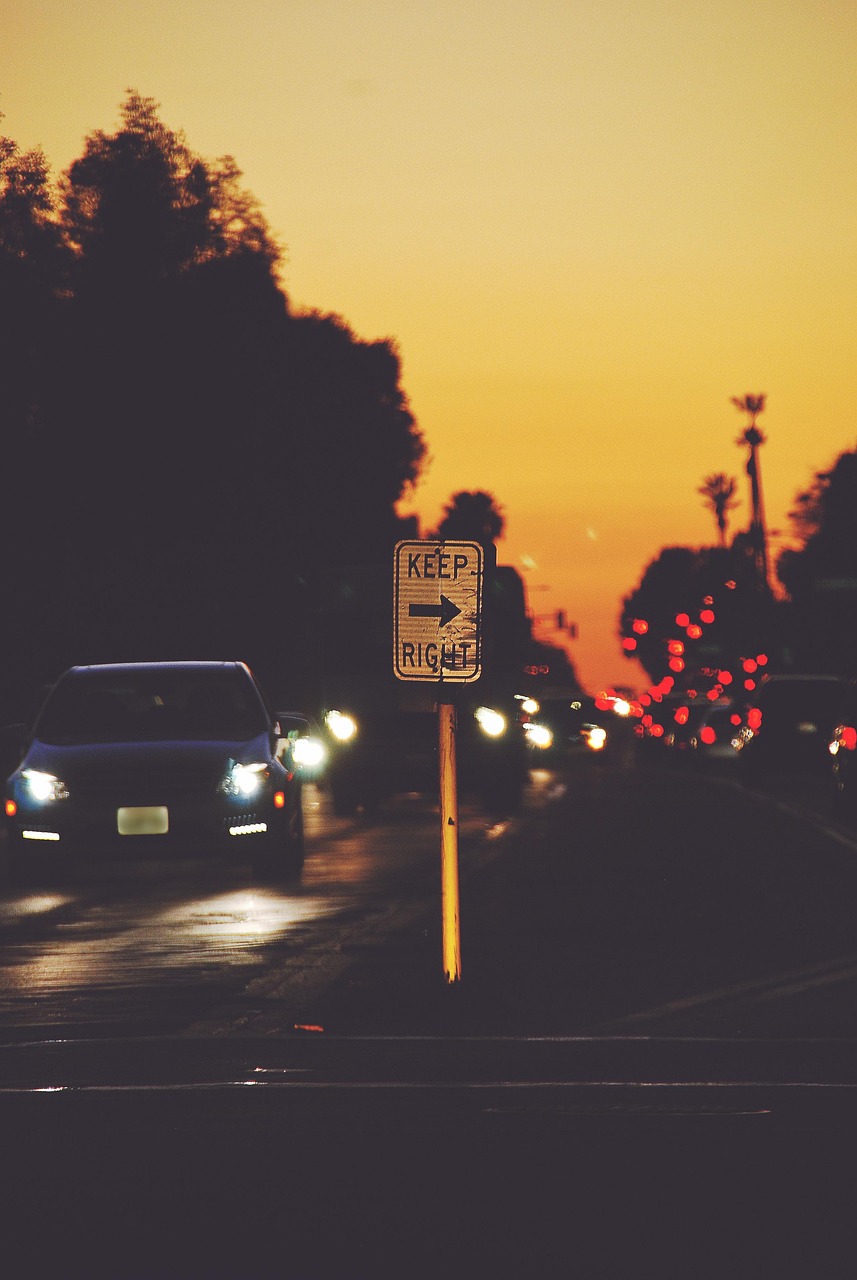 Keep right sign by a road from Pixabay: https://pixabay.com/photos/keep-right-sign-direction-arrow-5261952/